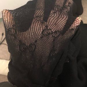2 pairs of fishnet tights. Never worn!